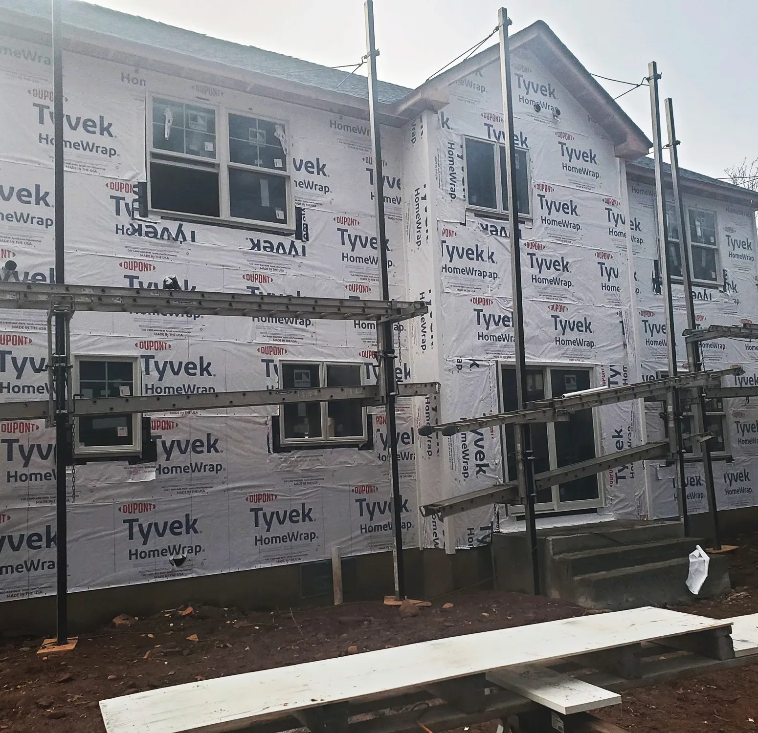 Home Exterior Upgrade Siding Replacement Trim Boards Installation Durable Home Solutions Curb Appeal Enhancement Exterior Design Transformation Pristine White Hardie Board Expert Siding Installation Weather-Resistant Siding