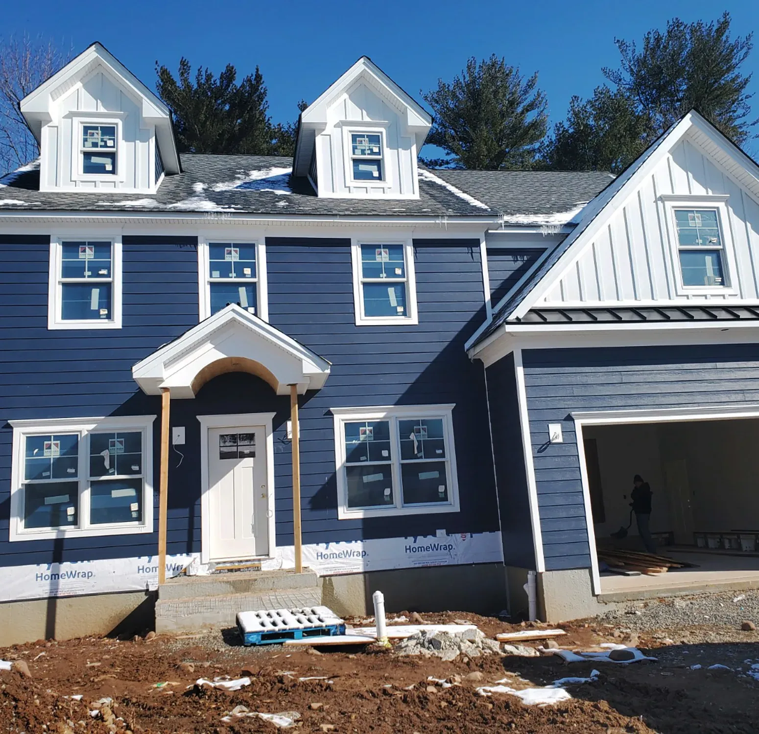 Home Exterior Upgrade Siding Replacement Trim Boards Installation Durable Home Solutions Curb Appeal Enhancement Exterior Design Transformation Pristine White Hardie Board Expert Siding Installation Weather-Resistant Siding
