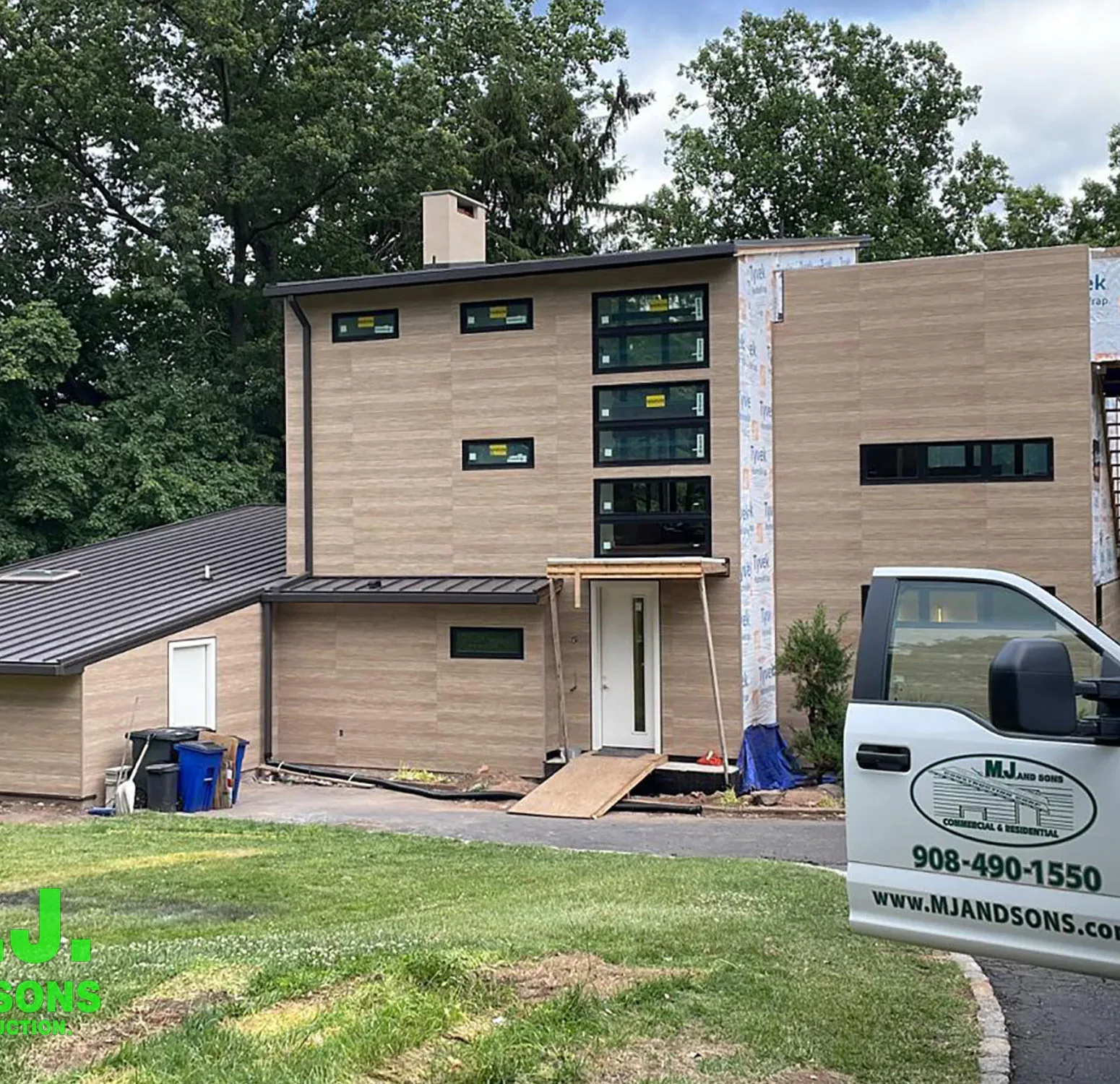 Exterior view featuring Nichiha fiber cement siding, a durable and stylish alternative to traditional wood siding, showcasing a modern and appealing facade with a wood-like appearance