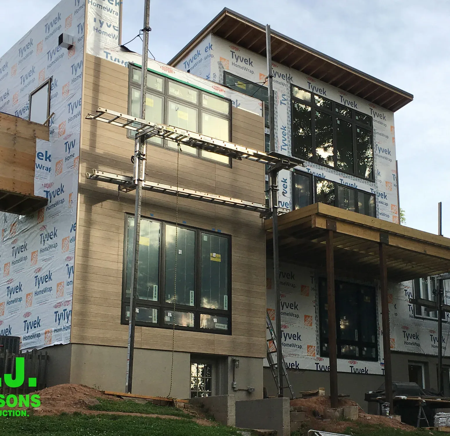 Exterior view featuring Nichiha fiber cement siding, a durable and stylish alternative to traditional wood siding, showcasing a modern and appealing facade with a wood-like appearance