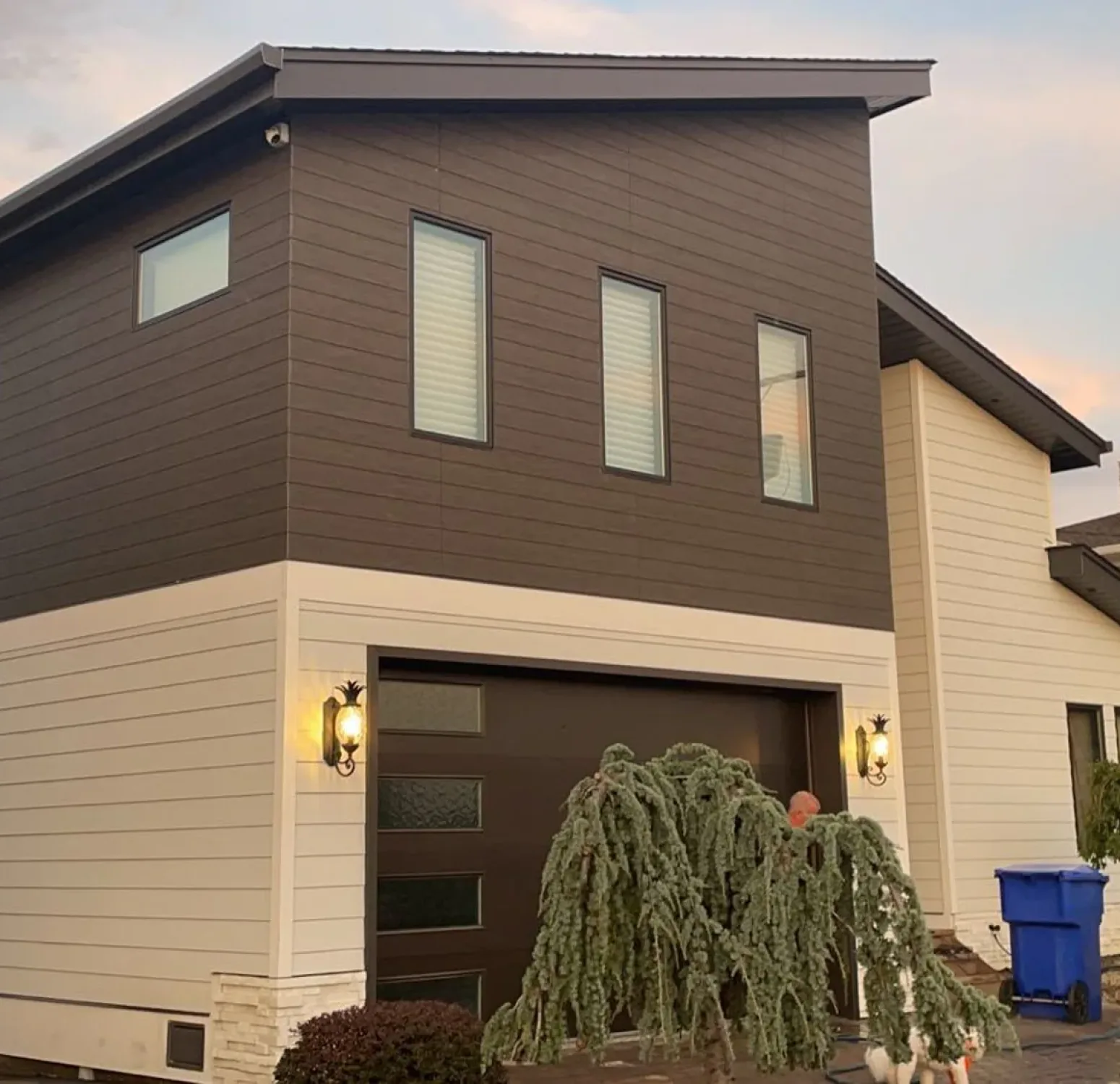 Beautifully finished Nichiha siding showing a nice contrast with dark and white colors